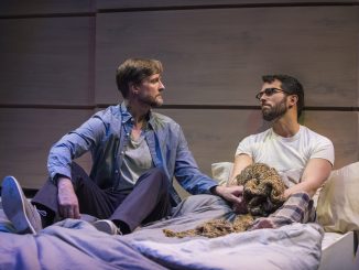 Two men in bed