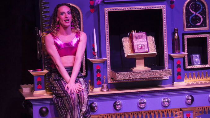 Gender Play 3. Photo by Zach Rosing Will perches on a mantle next to a copy of the complete works of William Shakespeare